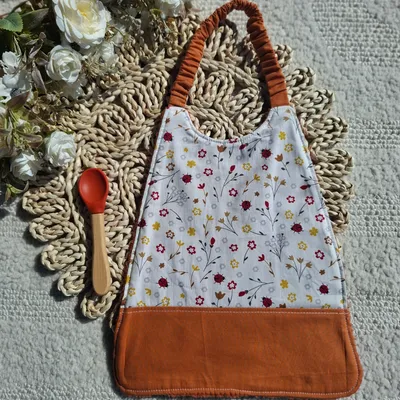 Bavoir élastique motifs liberty